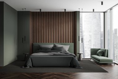 Yeşil duvarları, ahşap zemini, koyu gri kapağı ve panoramik pencerenin yanında duran rahat koltuğu olan şık bir yatak odası. 3d oluşturma