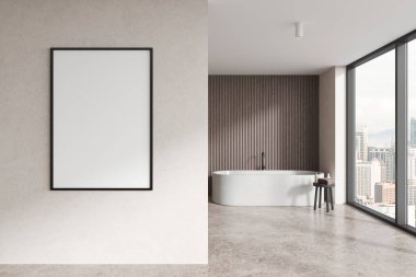 Banyo küveti, banyo aksesuarları ve bej beton zemini olan bej bir otel. Kuala Lumpur gökdelenlerinin panoramik penceresi. Duvar bölmesindeki boş posteri taklit et. 3B görüntüleme