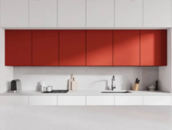 Helle Steintheke Auf Verschwommenem Hintergrund Der Rot Weißen Kücheneinrichtung Spüle — Stockfoto