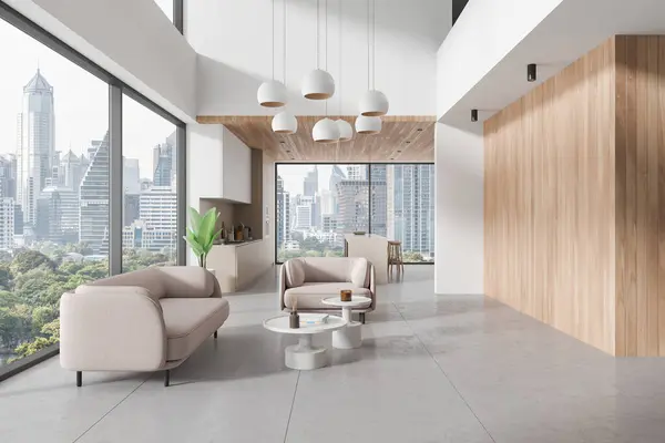 Luxury home studio interior with sofa and armchair, tile concrete floor. Cooking space with bar island and cabinet with kitchenware. Panoramic window on Bangkok skyscrapers. 3D rendering