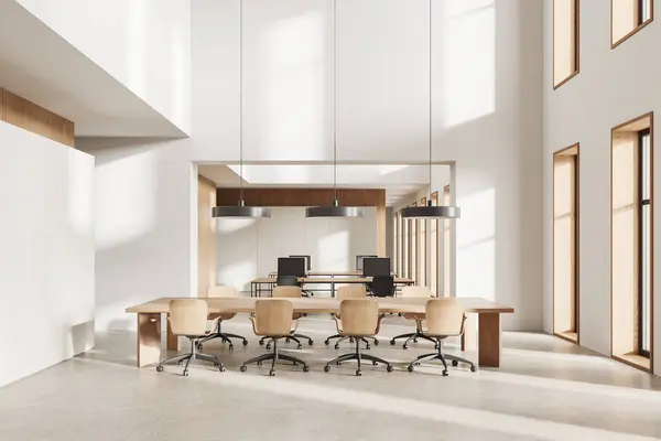 Beige and wooden office interior with conference board and wooden chairs, coworking zone with pc computers on table in row. Panoramic window. 3D rendering