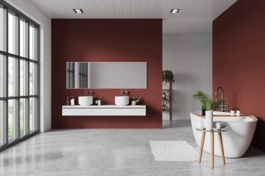 Beyaz ve kırmızı duvarlı modern banyonun içi, beton zemin, rahat beyaz küvet ve üzerinde uzun ayna olan rahat çift lavabo. 3d oluşturma