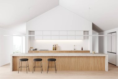 Beyaz duvarları, ahşap zemini, beyaz dolapları, ahşap dolapları ve tabureli uzun tahta adası olan modern mutfağın içi. 3d oluşturma