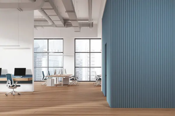 White and blue office loft interior with pc desktop, coworking zone with armchairs and desk in row on hardwood floor. Panoramic window on Singapore skyscrapers. Copy space wall. 3D rendering