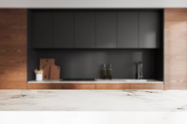 Şık mutfak iç dekorasyonunun bulanık arka planında boş mermer masa mutfak eşyaları ve sobalı yemek dolabı. Ürün gösterimi için kopyalama alanı oluşturun. 3B görüntüleme