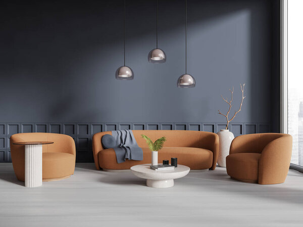 Interior of modern living room with gray walls, concrete floor, comfortable orange sofa and armchair standing near round coffee table and beautiful ceiling lamp. 3d rendering