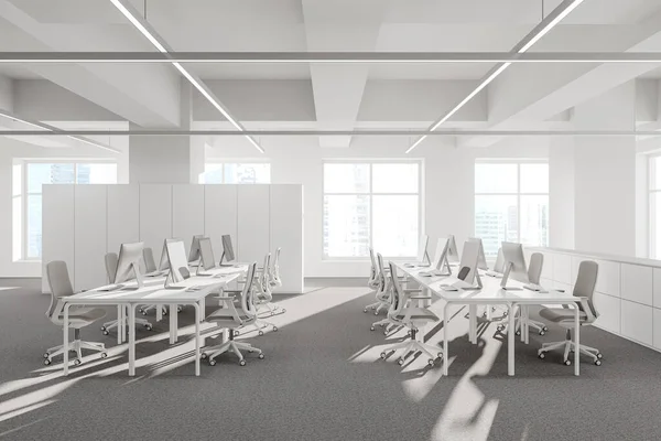 White workplace interior with pc computers on shared desk and chairs, carpet on the floor. Minimalist coworking space with panoramic window on Singapore skyscrapers. 3D rendering