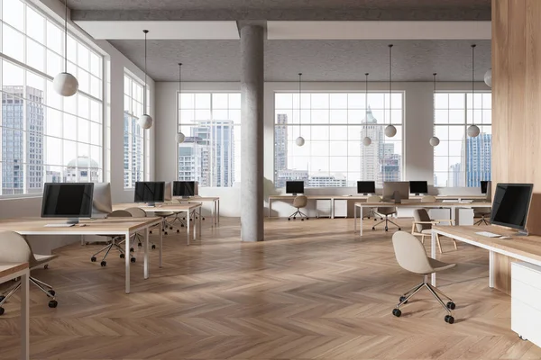 Stylish office interior with pc computers on shared desk in row, hardwood floor. Stylish coworking zone with panoramic window on Bangkok skyscrapers. 3D rendering