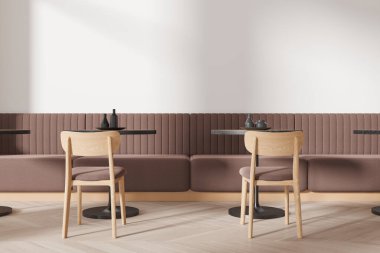 Lokantanın içi sandalyelerle dolu. Tabakları sıralı yuvarlak masa. Ahşap zeminde kahverengi kanepe. Minimalist kafe modern mobilyalarla besleniyor. 3B görüntüleme