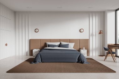 Modern yatak odasının içinde beyaz duvarlar, beton zemin, rahat kral yatağı mavi kapaklı ve pencerenin yanında duran tahta masa. 3d oluşturma