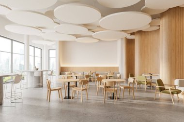 Beyaz ve ahşap duvarları olan modern restoranın köşesi, beton zemin, sandalyeli yuvarlak masalar ve rahat gri koltuklar. 3d oluşturma
