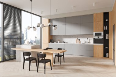 Beyaz duvarlı şık mutfak köşesi, beton zemin, gri dolaplar ve dolaplar ve sandalyeli uzun yemek masası. 3d oluşturma