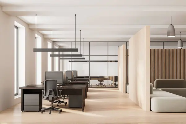 Wooden and white office interior with relax place and sofa, pc computers on desks in row. Stylish workplace and glass meeting room with board. 3D rendering