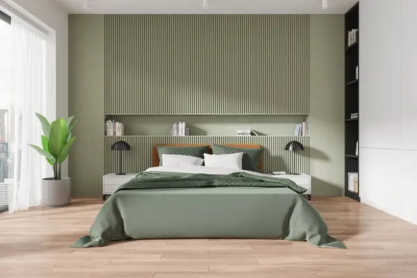 Interior of stylish bedroom with green and white walls, wooden floor, comfortable king size bed with two bedside tables. 3d rendering