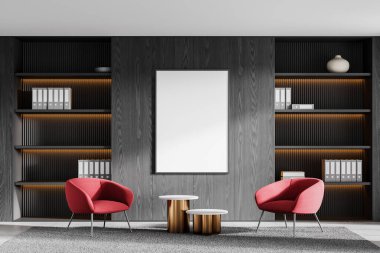 Modern ofis içi rahatlama ya da toplantı alanı, iki kırmızı koltuk ve sehpa, beton zeminde halı. Üzerinde belgeler olan siyah ahşap bir raf ve fotokopi odası posteri. 3B görüntüleme