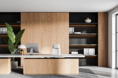 Ahşap ofis içi, masa başında bilgisayar, halının üstünde koltuk beton zemin. Çalışma alanı ve panoramik penceresi olan şık bir danışma odası. 3B görüntüleme