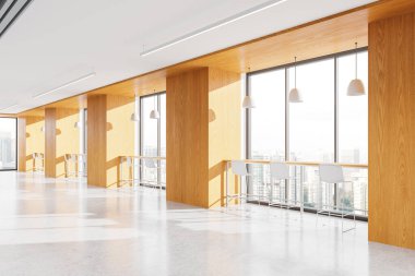 Modern ofisin köşesinde ahşap duvarlar, beton zemin ve şehir manzaralı büyük pencerelerin yanında duran tabureli dar masalar. 3d oluşturma