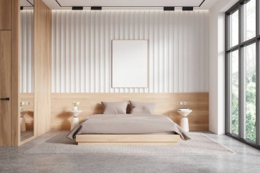 Modern yatak odasının içinde beyaz ve ahşap duvarlar, beton zemin, rahat kral yatağı, iki yuvarlak komodin ve dikey maket posterleri var. 3d oluşturma