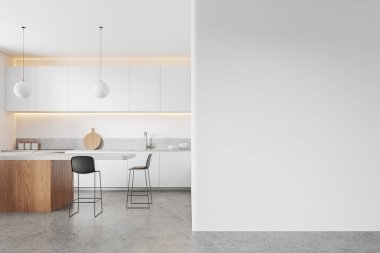 Beyaz duvarları, beton zemini, beyaz dolapları, dolapları ve tabureli, rahat, beyaz ve ahşap adaları olan şık bir mutfak. Sağ taraftaki uzay duvarını kopyala. 3d oluşturma
