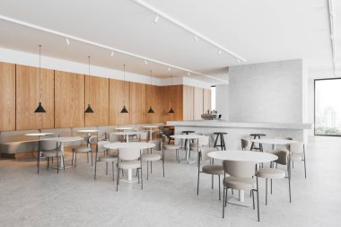 Beyaz ve ahşap duvarlı modern kafenin köşesi, beton zemin, sandalyeli yuvarlak yemek masaları ve rahat beyaz koltuklar. 3d oluşturma