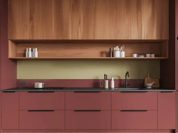 シンクと調理器と木製のカップボードで構築された快適な赤いキャビネットは 緑の壁とモダンなキッチンインテリアに立っています 3Dレンダリング — ストック写真