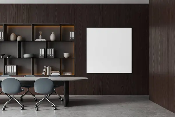 Dark conference interior with chairs in row and table, wooden shelf with folders and decoration. Negotiation space and mock up canvas square poster on wall. 3D rendering
