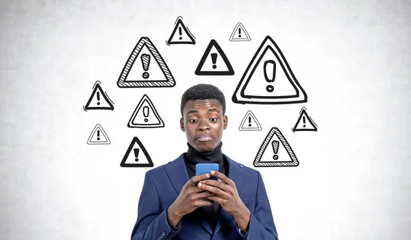 Portrait Young African American Man Holding Smartphone Standing Concrete Wall — Stock Photo, Image
