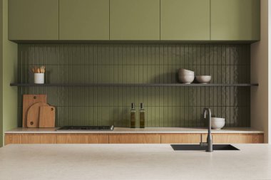 Şık yeşil mutfak tezgahı, lavabosu ve ocağı, tabakları ve tabakları raflarda. Modern apartmandaki minimalist yemek pişirme alanına yakın çekim. 3B görüntüleme