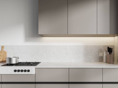 Bej rengi, modern ev mutfağı. Soba, esrar, bıçak ve tezgahta kesim tahtası. Modern apartmandaki minimalist yemek alanına yakın çekim. 3B görüntüleme