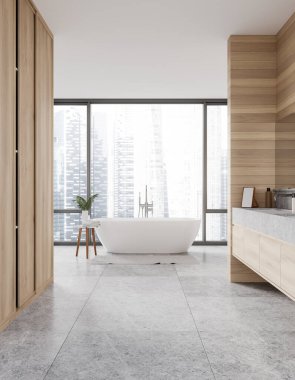 Küveti ve yan masası olan modern ev banyosu, beton zeminde ayak havlusu. Ahşap raf, aksesuarlarla batmak. Singapur gökdelenlerinin panoramik penceresi. 3B görüntüleme