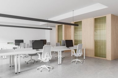 Beyaz ve ahşap duvarları, beton zemini ve gri sandalyeli sıralı bilgisayar masaları olan şık bir açık uzay ofisinin köşesi. 3d oluşturma
