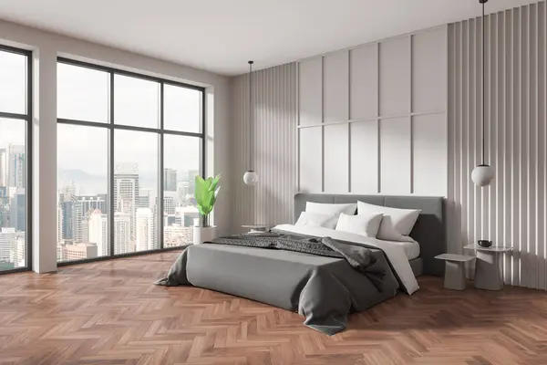 stock image A modern bedroom with a large bed, floor-to-ceiling windows, and urban skyline in the background, concept of luxury living. 3D Rendering