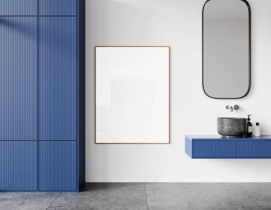 Beyaz ve mavi banyo, lavabo ve aynalı, aksesuarlı şifonyer ve beton döşemeli. Duvardaki uzay tuvali posterini kopyala. 3B görüntüleme