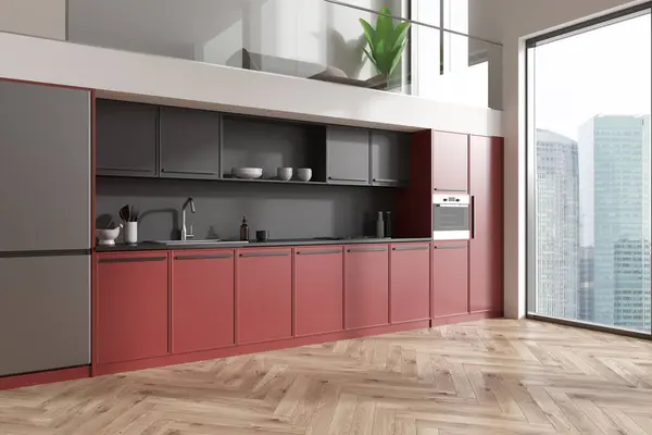 Hjørnevisning Etasjes Kjøkkeninteriør Med Svart Rødt Skap Kjøleskap Tregulv Sofa stockbilde