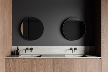 Ev banyosunun içini çift lavabo, iki yuvarlak ayna, tezgahta aksesuarlar ve ahşap şifoniyerle kapatın. Minimalist dairede banyo alanı. 3B görüntüleme