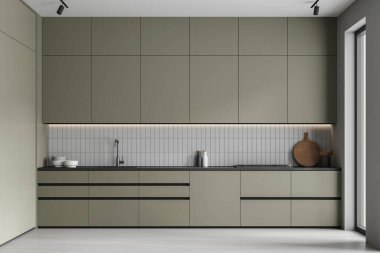 Yeşil, modern ev mutfağı. Soba ve lavabo, mutfak gereçleri tezgahta. Panoramik pencere ve parlak beton zemin. Modern dairede dolabı olan minimalist yemek alanı. 3B görüntüleme