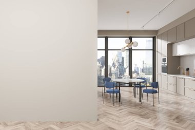 Zarif ev mutfağı yuvarlak yemek masası ve mavi sandalyeler, bej mutfak gereçleriyle bej yemek dolabı. New York gökdelenlerinin panoramik penceresi. Boş duvar bölmesini düzenle. 3B görüntüleme