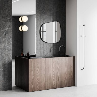 Modern banyo içi ahşap dolap, koyu fayans duvarı, ve eşsiz ayna, ışık ayarı, minimalist tasarım. 3B Hazırlama