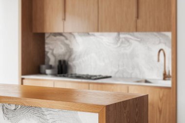 Modern mutfak iç mimarisi, ahşap tezgahın kapağı, bulanık mermer arka plan, parlak çevre, ev tasarımı konsepti. 3B Hazırlama