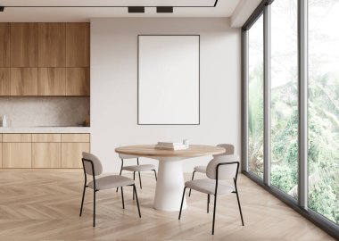 Duvarında boş bir poster ve yeşil camları olan modern bir yemek odası. Açık renk ve minimalist tasarım sakin bir atmosfer yaratır. Poster modeli konsepti. 3B Hazırlama