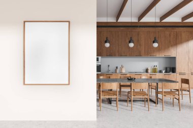 Ahşap çerçeveli boş bir poster. İç duvarda, ahşap dolaplı modern bir mutfağın yanında. Mutfak dekoru kavramı. 3B Hazırlama