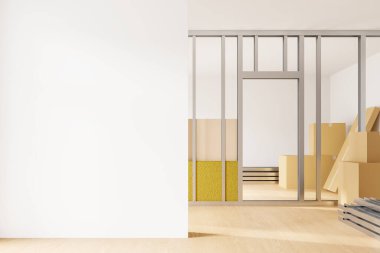 Minimalist ofis inşaatı, iş toplantı odasının yenilenmesi. Ahşap zeminde karton kutular ve malzeme var. Boş duvar bölmesini düzenle. 3B görüntüleme