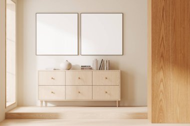 Açık renkli oturma odası, ahşap büfe, sanat dekorasyonu, podyum ve ahşap zemin. Konforlu İskandinav tasarımı ve sıra sıra dizilmiş iki kare tuval poster. 3B görüntüleme