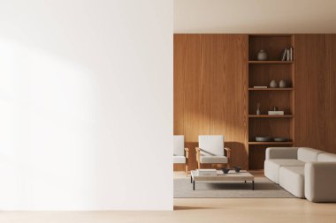 Konforlu oturma odasının içinde kanepe, iki koltuk, raf ve ahşap döşemeli kahve masası var. Boş duvar bölmesini düzenle. 3B görüntüleme