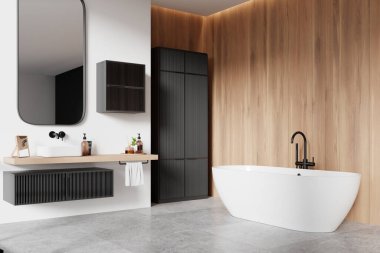 Lavabo, gösteriş ve aksesuarlı ev banyosu manzarası. Beton zeminde beyaz küvet ve siyah şifonyer. Minimalist dairede sıcak banyo alanı. 3B görüntüleme 