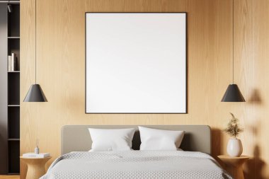 Modern yatak odasının içi yatağın üstünde boş bir çerçeve, açık tahta duvar arka planı, ev tasarımı kavramı. 3B Hazırlama