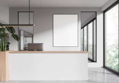 Modern ofis resepsiyonu beyaz bir masada bir bilgisayar, büyük pencereler, ve duvarında boş bir çerçeve, minimal iç tasarım konsepti. 3B Hazırlama