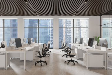 Modern açık uzay ofisi, birden fazla iş istasyonu, büyük pencerelerden gelen doğal ışık, şehir manzarası. İş yeri kavramı. 3B Hazırlama