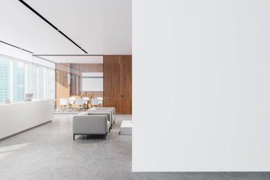 Ofisin içinde bekleme alanı, koltuklar ve kahve masası var. Bilgisayar resepsiyonda. Cam konferans odası ve gökdelenlerin panoramik penceresi. Boş duvar bölmesini düzenle. 3B görüntüleme