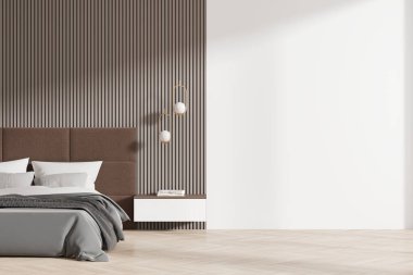 Açık kahverengi otel odası, iç yatağı gri keten kaplı, ahşap döşemeli. Komodinli ve dekorasyonlu rahat bir uyku odası. Boşluk duvarını kopyala. 3B görüntüleme